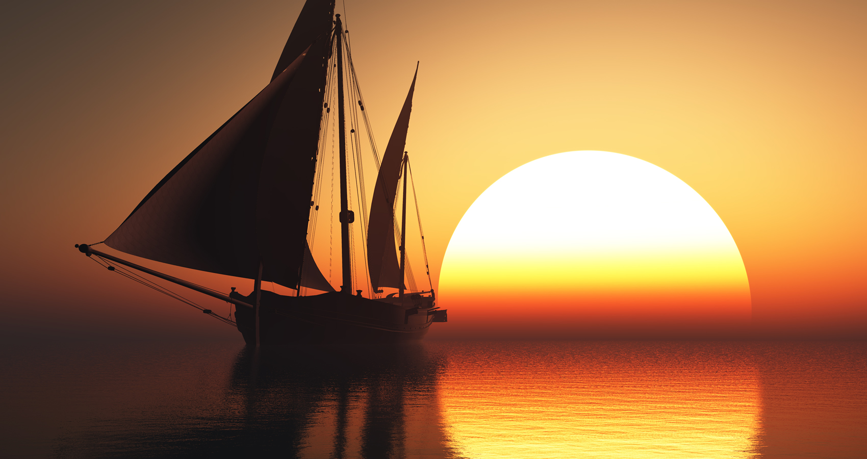 sail boat on the ocean at sunset